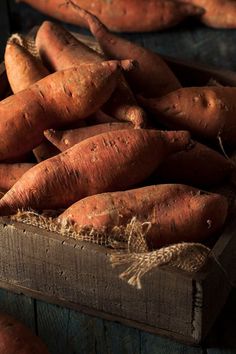 fresh carrots on display at an outdoor farmers market - stock photo -'s