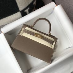 HM Greige Togo Brown With Gold Toned Hardware Bag For Women Hermes Kelly Bag, Kelly Bag, Hermes Bags, Evening Clutch Bag, Types Of Bag, Bag For Women, Fun Bags, Fashion Handbags, A Year