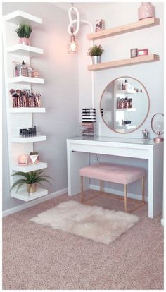 a white desk with shelves and a mirror on it in front of a pink rug