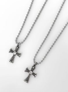 Introducing your new favorite layer - the 'VENEZIA' cross chain. Featuring stunning cross pendants cascaded in CZ gemstones and a stainless steel ball chain, this piece will easily become a daily essential in your jewelry collection. Wear the 'VENEZIA' on its own, or pair with our 'SAINT' pearl necklace for a stacked look! Made with stainless steel ball chain and zinc alloy pendant. Available in lengths 16", 18", 20", 22". Model is wearing 18". Handmade in Los Angeles. Cross Chain Necklace, Cross Chain, Ball Chain, Cross Pendant, Zinc Alloy, How To Introduce Yourself, Pearl Necklace, Jewelry Collection, Chain Necklace