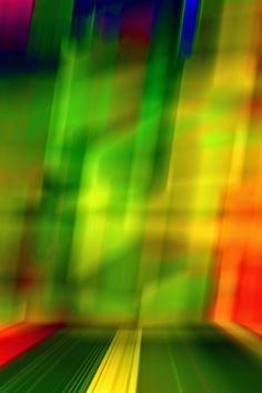 blurry photograph of colorful lines in motion