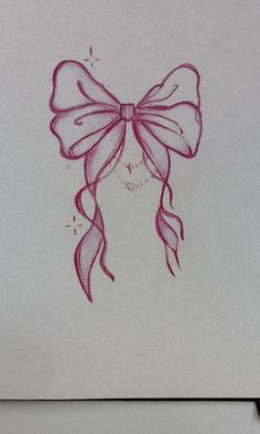 a drawing of a pink bow with long hair