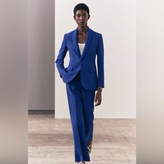 Zara Flared Pants. Never Worn Fitted Wide Leg Suits With Pockets, Fitted Wide-leg Suits With Pockets, Elegant Blue Straight Leg Pantsuit, Spring Slim Fit Suits With Straight Leg, Spring Slim Fit Straight Leg Suits, Blue Straight Leg Spring Pantsuit, Business Casual Blue High-waisted Pantsuit, Blue Straight Leg Pantsuit For Spring, Fitted Zara Pantsuit For Office