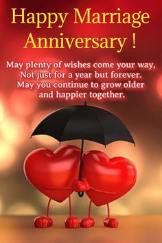 two hearts holding an umbrella with the words happy marriage anniversary