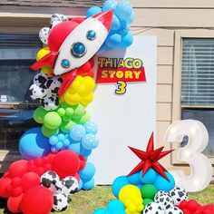 balloons are arranged in the shape of animals and stars, including a rocket ship that says chicago story 3