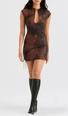 ANTIQUE COPPER LACE UP MINI DRESSThe Antique Copper Lace Up Mini Dress is the ultimate party dress that will make you stand out from the crowd. Made from lustrous satin with a hint of stretch, this dress is designed to fit like a glove and accentuate your curves. The antique copper tone adds a touch of sophistication, while the lace up detail at the hem adds a flirtatious vibe.Key Features: Flattering keyhole neckline to showcase the bust Side opening reveals a generous flash of skin Self-tie la Trendy Mini Corset Dress For Party, Trendy Mini Length Corset Dress For Party, Fitted Mini Slip Dress For Date Night, Fitted Mini-length Slip Dress For Date Night, Club Mini Dress With Ruched Details, Fitted Mini Bodycon Dress For Club, Ruched Satin Mini Corset Dress, Stretch Satin Mini Dress For Summer, Ruched Satin Corset Dress Mini Length