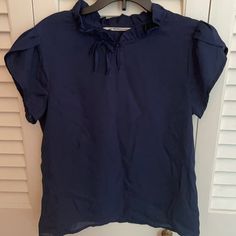 Navy Blue Short-Sleeved Blouse With Button-Front Closure; Sz 13-14 - Never Worn Navy Short Sleeve Blouse For Summer, Navy Short Sleeve Tops For Work, Blue Short Sleeve Top For Spring, Blue Ruffled T-shirt For Summer, Navy Short Sleeve Top For Spring, Blue Casual Short Sleeve Top For Spring, Casual Navy Short Sleeve Blouse, Casual Blue Short Sleeve Top For Spring, Blue Short Sleeve Blouse For Work