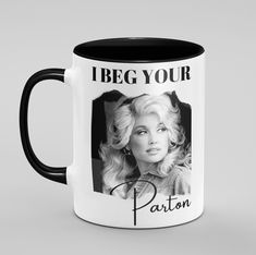 a black and white coffee mug with the words, i beg your patron