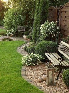 a bench sitting in the middle of a garden