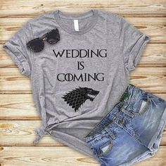 Game of Thrones Wedding Shirts, Bachelorette Shirts, Bachelorette party tank tops, He Bent the Knee, Hand of the Bride, GOT t-shirts, Personalized party shirts, Khaleesi V-neck, House Stark, Wedding…More #bachelorettetshirt #bachelorette #etsy #tee #tshirt #etsyclothes #bachelorettegifts #bacheloretteshirt #tees #bacheloretteparty #etsyshirt Funny Pregnancy Shirts, Teens Movies, Logo Sport, Funny Shirt Sayings, Mama T Shirt, Hipster Outfits, Dog Mom Shirt, Bachelorette Shirts