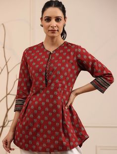 HAND CRAFTED TUNIC DESCRIPTION * Maroon and black a-line kurti * Ethnic motifs printed * Keyhole neck, three-quarter, regular sleeves * Machine weave regular pure cotton *Fabric:- pure Cotton  *Wash Care:- Hand Wash AVAILABLE IN 6 SIZES THEY ARE IN FOLLOWING MEASUREMENTS IN INCHES:- XS:- Bust-34/Waist-26/Length-30 S:- Bust-36/Waist-28/Length-30 M:- Bust-38/Waist-30/Length-30 L:- Bust-40/Waist-32/Length-30 XL:- Bust-42/Waist-34/Length-30 XXL:- Bust-44/Waist-36/Length-30 NOTE ►►CUSTOMISATION We do Traditional Red Printed Kurta, Traditional Red Block Print Top, Traditional Ikat Print Tops For Festive Occasions, Traditional Festive Patterned Tops, Cotton Tops For Jeans, Cotton Kurtis For Women, Cotton Short Tops, Ethnic Kurti, Kurti Top