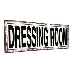 a sign that says dressing room on it