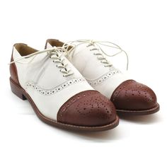 This classic cap toe oxford is good for strolling down the avenue and gliding around the dance floor. It features classic natural leather welts with contrast stitching. All leather construction with leather soles Whole and half sizes, 6 ½-13 Imported Sizing Generally fits true to size, but runs a bit narrower than our Fitted Oxfords With Leather Sole, Leather Cap Toe Oxfords For Fall, Fitted Oxford Lace-up Shoes With Rubber Sole, Fitted Lace-up Oxford Shoes With Rubber Sole, Fall Oxfords With Cap Toe, Fall Oxfords With Leather Sole, Fall Oxford Shoes With Leather Sole, Fitted Plain Toe Oxford With Leather Sole, Fall Cap Toe Oxfords With Rubber Sole