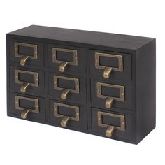 a black and gold file cabinet with six drawers on each side, one drawer open