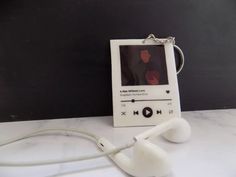 an mp3 player with headphones attached to it