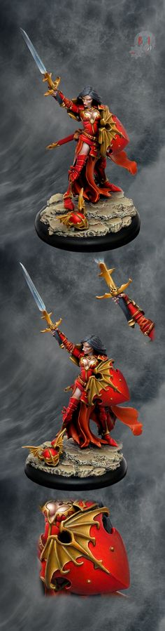 two red and gold painted warhammers with swords