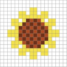 a cross stitch pattern with squares in yellow and brown, as well as an orange square