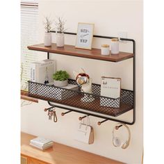 a shelf with some items on top of it and hanging from the wall next to each other