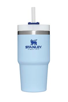 the stanley tumbler is light blue and has a straw in it