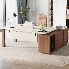 an office with a desk, chair and bookshelf