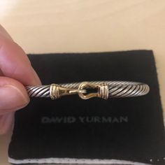 David Yurman 5mm Cable Classic Buckle Bracelet With 14k Gold Metal: 14k Gold And Sterling Silver Size- Small Condition Is Pre-Owned. Includes Brand New David Yurman Cleaning Cloth. You Can Take The Bracelet To Any David Yurman Store, They Offer Complimentary Cleaning, This Will Assure You Item Is Authentic. David Yurman Stacked Bracelets, David Yurman Bracelet Stack, David Yurman Cable Bracelet, Silver Bracelet Stack, Yurman Bracelet, Silver Jewlery, David Yurman Bracelet, Cable Bracelets, David Yurman Jewelry