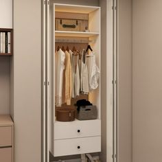 an open closet with clothes and other items