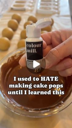 someone is making cake pops with colored milk