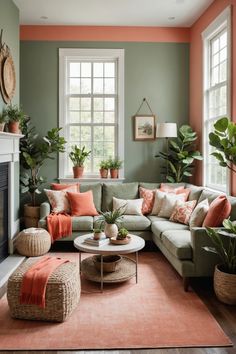 a living room filled with lots of furniture and plants on top of the couches