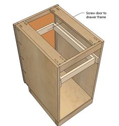 an unfinished cabinet with the drawer open and labeled on it's side, including screws