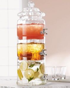 a stack of glasses filled with different types of drinks