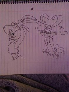 a drawing of two cartoon characters on lined paper