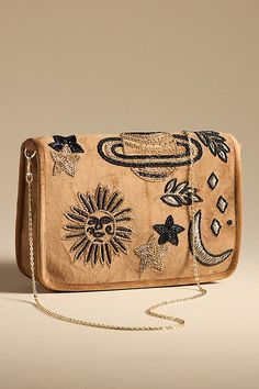 Glass beads; polyester One inner slip pocket Magnetic closure Detachable chain strap Imported | Celestial Velvet Clutch by Anthropologie in Gold, Women's, Polyester/Glass Velvet Clutch, Perfect Handbag, Unique Bags, Winter 2024, Bags Purses, Style Profile, Women's Bags, Magnetic Closure, Chain Strap