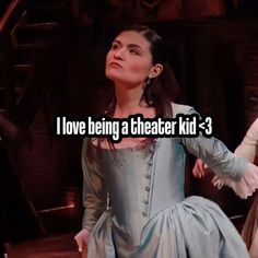 a woman in a blue dress with the words i love being a theater kid - 3