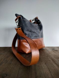 This waxed canvas and leather hobo bag is made with durable and first quality waxed canvas ( oilskin ) and Italian leather. If you are looking for a strong and versatile waxed canvas bag this crossbody hobo bag in waxed canvas and leather is perfect for you. If you love travel in the nature, well, this is your bag! Waxed Canvas Bag, Hobo Crossbody Bag, Canvas Crossbody Bag, Love Travel, Leather Hobo Bag, Waxed Canvas, Satchel Bag, Leather Hobo, Open Top