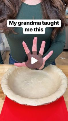 a woman is holding out her hand in front of a pie pan with the words, my grandma taught me this