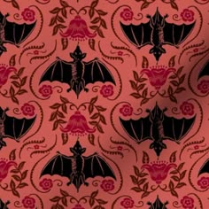 a red and black bat pattern on a pink background