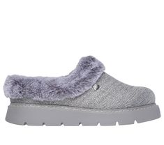 Add a little sparkle to your relaxed, cozy look wearing BOBS from Skechers Keepsakes Lite - Bejeweled One. This clog-style slipper features a metallic knit upper with a plush faux-fur collar and lining, plus a cushioned Skechers Memory Foam footbed. For every BOBS purchase, a donation is made to animals in need. | Skechers Women's BOBS Keepsakes Lite - Bejeweled One Slipper | Medium Width | Skechers Memory Foam cushioned comfort footbed | Metallic knit upper with a plush faux-fur collar and lini Skechers Memory Foam, Clogs Style, Skechers Women, Faux Fur Collar, Fur Collars, Grey Fashion, New Product, Clogs, Memory Foam