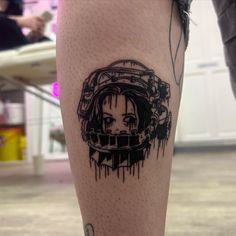 a person with a tattoo on their leg