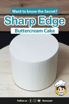 a white cake sitting on top of a wooden table next to a sign that says, what to know the secret? sharp edge buttercream cake