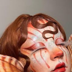 Saphron on Instagram: "Creature collab🧜🏻‍♀️ A collaboration with these incredibly talented artists! (In order of photos) @itsallabouttheblush @christina.alexandraa @e.l_makeupfx @kai.ackroyd @majagorenc @byamylaurenmua My look is inspired by lion fish/mermaids, along with some inspo from Lola from sharks tale😅 I’m hoping to do more mermaids like this so feel free to recommend me some underwater creatures to be inspired by!:) also btw, this image has no skin retouching so you can see al Mythical Creature Makeup Looks, Lion Fish Costume, Lion Inspired Makeup, Lionfish Makeup, Red Mermaid Makeup, Fish Inspired Makeup, Lion Fish Mermaid, Lola Shark Tale