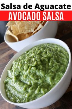 two bowls filled with guacamole and tortilla chips next to each other