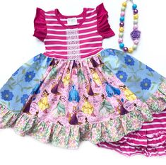 Our Listen to your heart Princess dress is fashioned in our knit purple stripe bodice & a cotton full ruffle skirting, perfect for wowing the crowd! Custom designed from a delightful mix of prints that please & colors that pop. Great for theme parties, movie outings, magical vacations, birthday parties, portraits, & everyday wear!All designs are tagged in the even size. Size/length: 12mo/18mo: 17" 2/3: 21" 4/5: 24" 6/7: 26" 8" 28"Chest width unstretched: sz 12mo/18mo: 20" 2/3: 20" 4/5: 22.5" 6/7 Spring Princess Dress With Ruffled Skirt, Pink Cotton Dress With Ruffled Skirt, Playful Fitted Dress For Dress-up Occasions, Playful Fitted Dresses For Dress-up, Playful Fitted Dress With Ruffle Hem, Cute Fitted Purple Dress, Cute Fitted Purple Dresses, Purple Princess Dress For Spring, Spring Dress-up Ruffled Dress