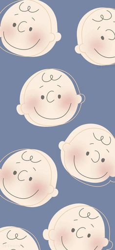 four children's heads with different expressions on them, one is smiling and the other has