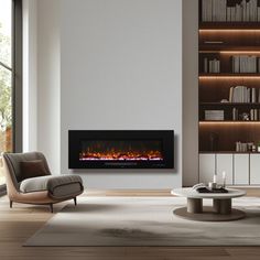 a modern living room with a fireplace and bookcases