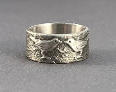 Two love birds sit together on this ring. It's sterling overlayed with fine silver. The patina brings out the details. These are custom made to your size and take about 2 weeks. Since I make each one by hand, no two are exactly alike. I can also work with you to create a design of your own. Contact me so we can discuss your ideas further. If you are unsure of your size, you can purchase this ring sizer. It is adjustable, tells you the size, and can be reused indefinitely. The purchase of the siz Genderqueer Fashion, Two Love Birds, Bird Ring, Bird Rings, S Ring, Chasing The Sun, Second Love, Swallows, Everyday Rings