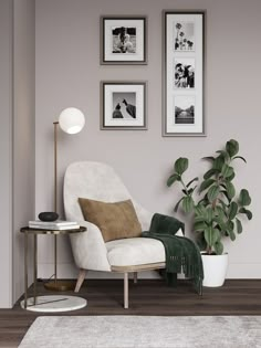 a white chair sitting next to a potted plant