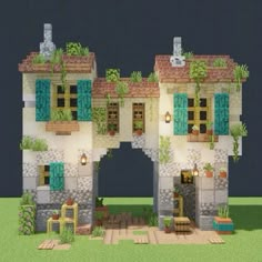 an image of a house that is made out of legos and has plants growing on the windows