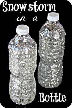 two plastic water bottles sitting next to each other on a black background with the words snow storm in a bottle