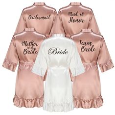 Wedding Party Team Bride Robe With Black Letters Kimono Satin Bridesmaid Personalized Bathrobe Bridal Party Package: 1x bathrobe 🤍PRODUCT DIMENSIONS🤍 Please refer to the listing's photo.  🤍SHIPPING🤍 Estimate Delivery Time: 10-15 working days worldwide. This is an estimate only. We always try our best to have your item(s) delivered on time however sometimes there might be some delays which are beyond our control. Your understanding in such circumstances will be greatly appreciated. 🤍REVIEWS Satin Gown For Bridal Shower, Bridesmaid Robes Personalized, Bridesmaid Bathrobe, Bride Robes, Personalized Bathrobe, Bridesmaid Robe Personalized, Rose Gold Satin, Bridal Party Robes, Wedding Bridal Party