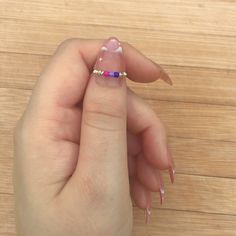 These bi pride flag rings can be the perfect way to subtly show off your identity, or a thoughtful gift to your loved ones in the LGBTQ community! These rings are made to fit ALL bisexual individuals and are also perfect for couples as an anniversary or just-because gift. Save up to 20% when you shop multiple listings in our store! -Wide Variety of Size Options  -Midi Ring Sizes -Choose Your Band Color -Durable -Comfortable Fit -Designed and Handmade by Seller -LGBT Owned and Operated Bisexual Jewelry, Bi Flag, Bisexual Flag, Midi Ring, Pride Gifts, Midi Rings, Just Because Gifts, Pride Flag, Ring Sizes